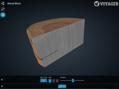 screenshot of Voyager web component with a brown wooden block sliced in half. The exposed half shows a greyscale CT image.